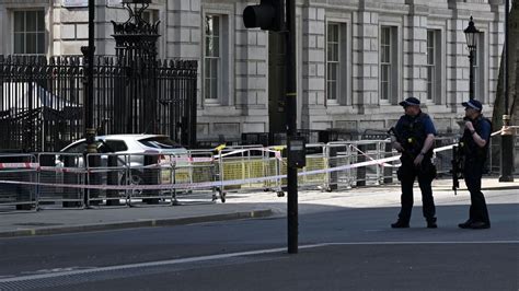 Man arrested after car driven at gates of Downing Street in London